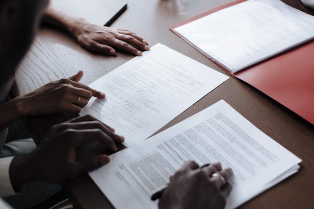 Two People Reviewing Documents