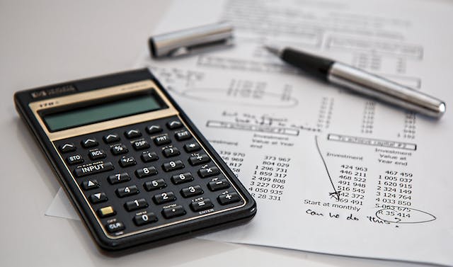 calculator-on-finance-sheets
